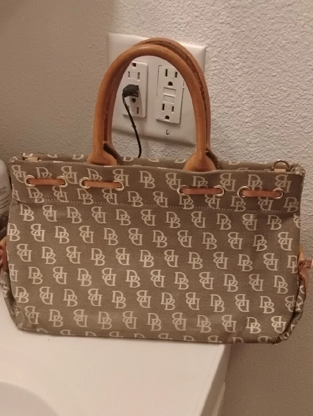 Dooney & Bourke Beige/Tan Signature Logo Tote with Tassel